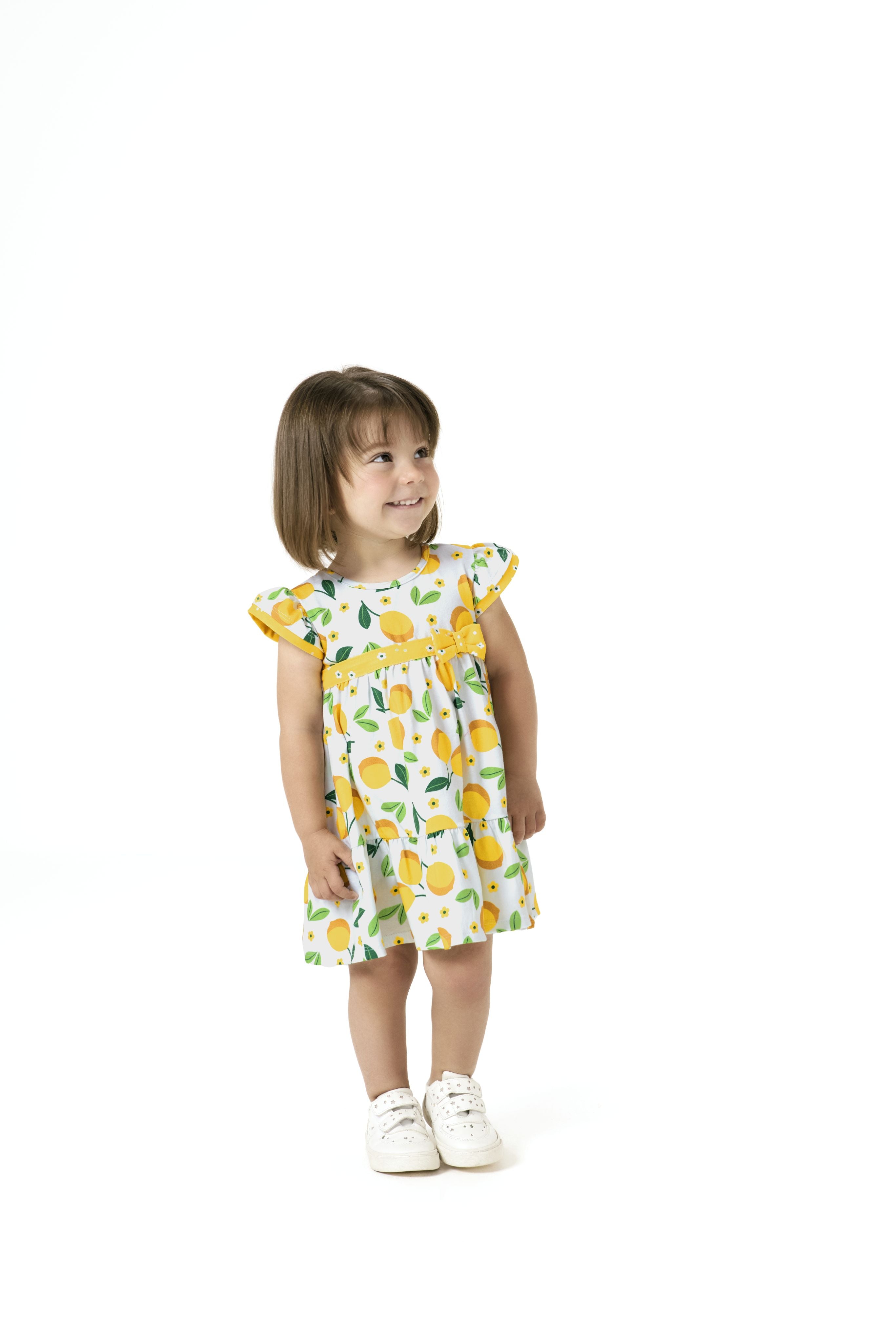 Vestido blanco bebé con estampado de limones y lazo amarillo (tallas 9‑12 m a 3T)