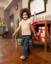 Pantalón de mezclilla azul oscuro con lazos para niña