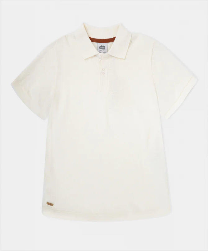 Camiseta tipo polo marfil niño talla 2T‑5T vista frontal