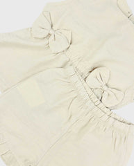 Conjunto Blusón Con Moño y Short Detalles