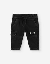 Pantalón negro DOG LOSAN para niño con estampado de perrito vista frontal.