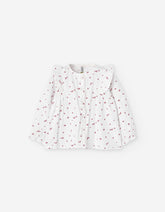Blusa infantil blanca con flores lila y volantes LOSAN