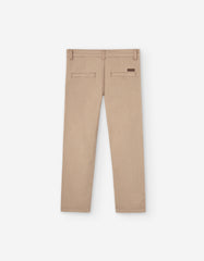 Vista frontal de pantalón beige recto para niño
