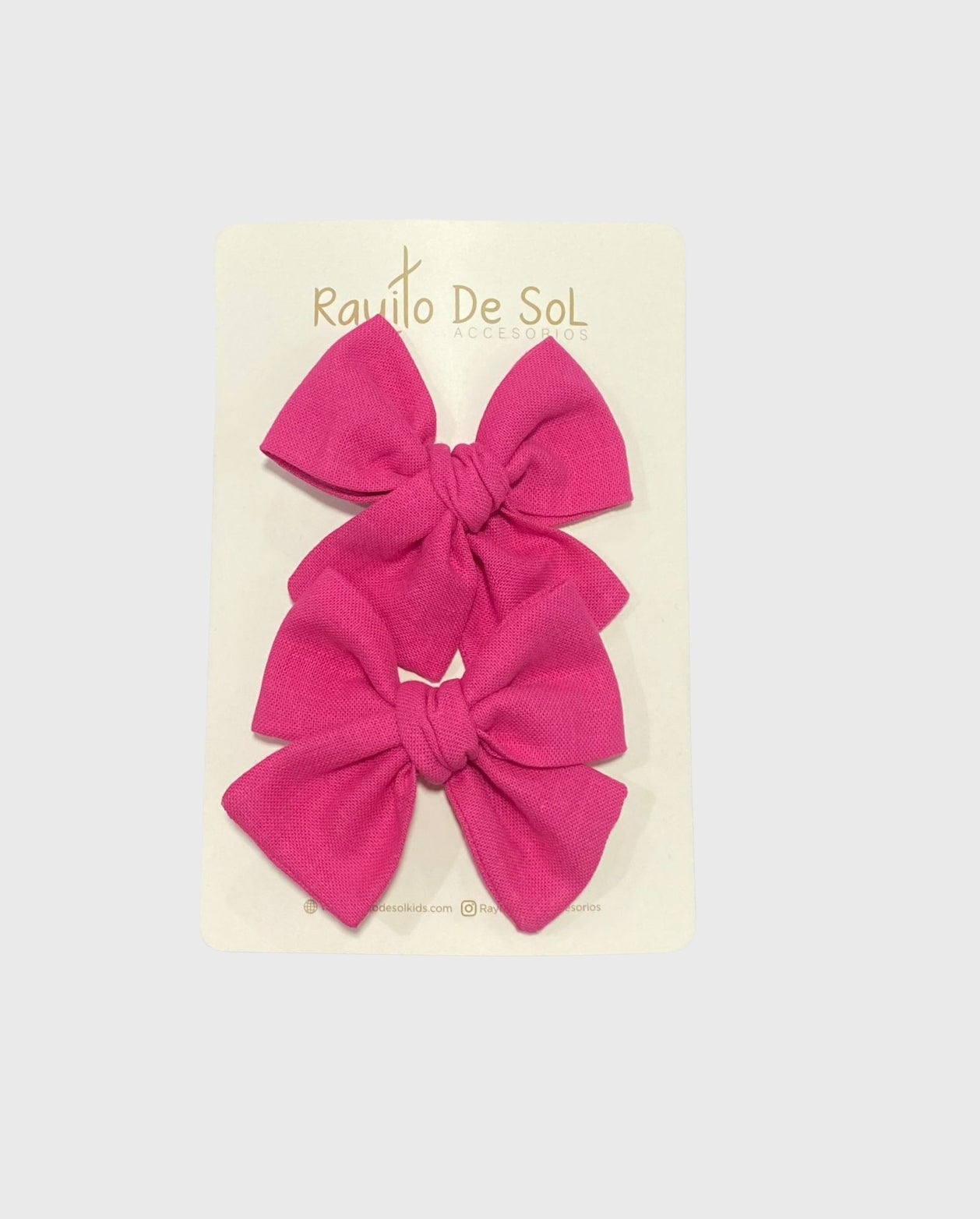 Set 2 Pinzas Moño Fucsia Rayito de Sol