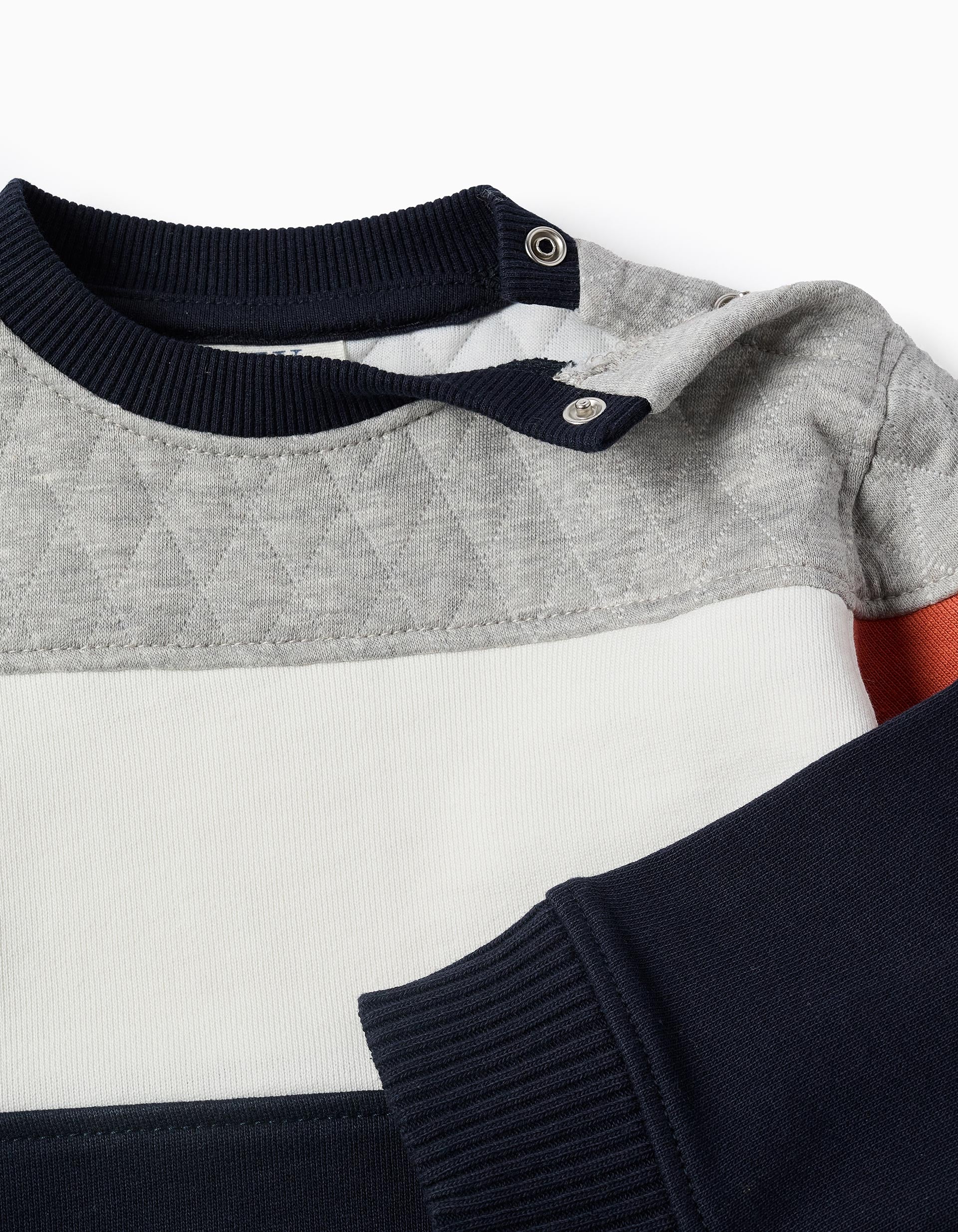 Vista trasera sudadera combinada niño fleece colores diferentes