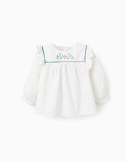 Blusa blanca de bebé con bordados florales y volantes Zippy 6‑36M