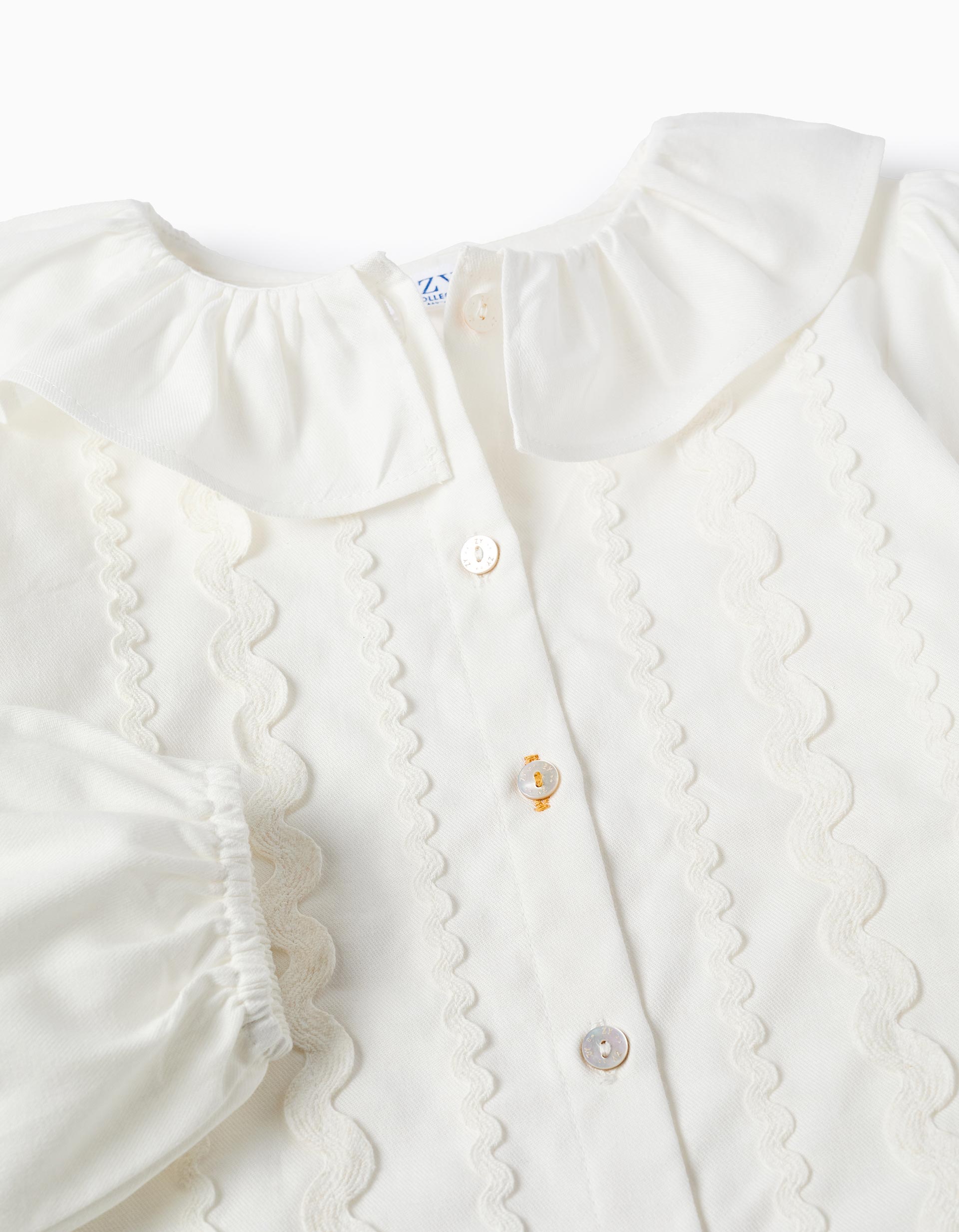 Blusa Manga Larga Cuello Beige Niña Zippy detalle