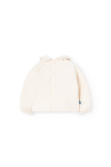 Conjunto infantil beige y azul con textura suave