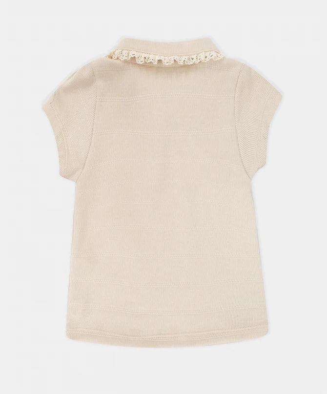 Parte trasera de blusa beige niña diseño casual elegante
