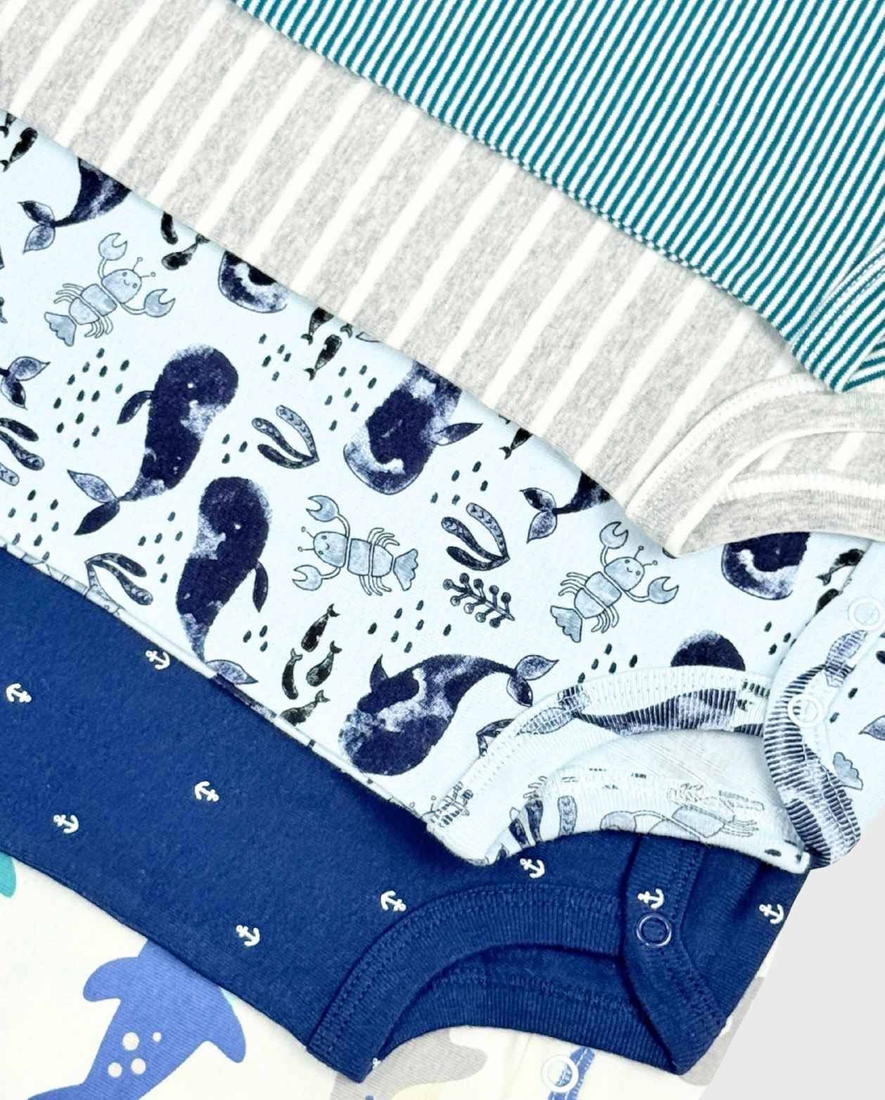 Set 5 Bodys Estampado Esqueleto Animales del Mar Detalles