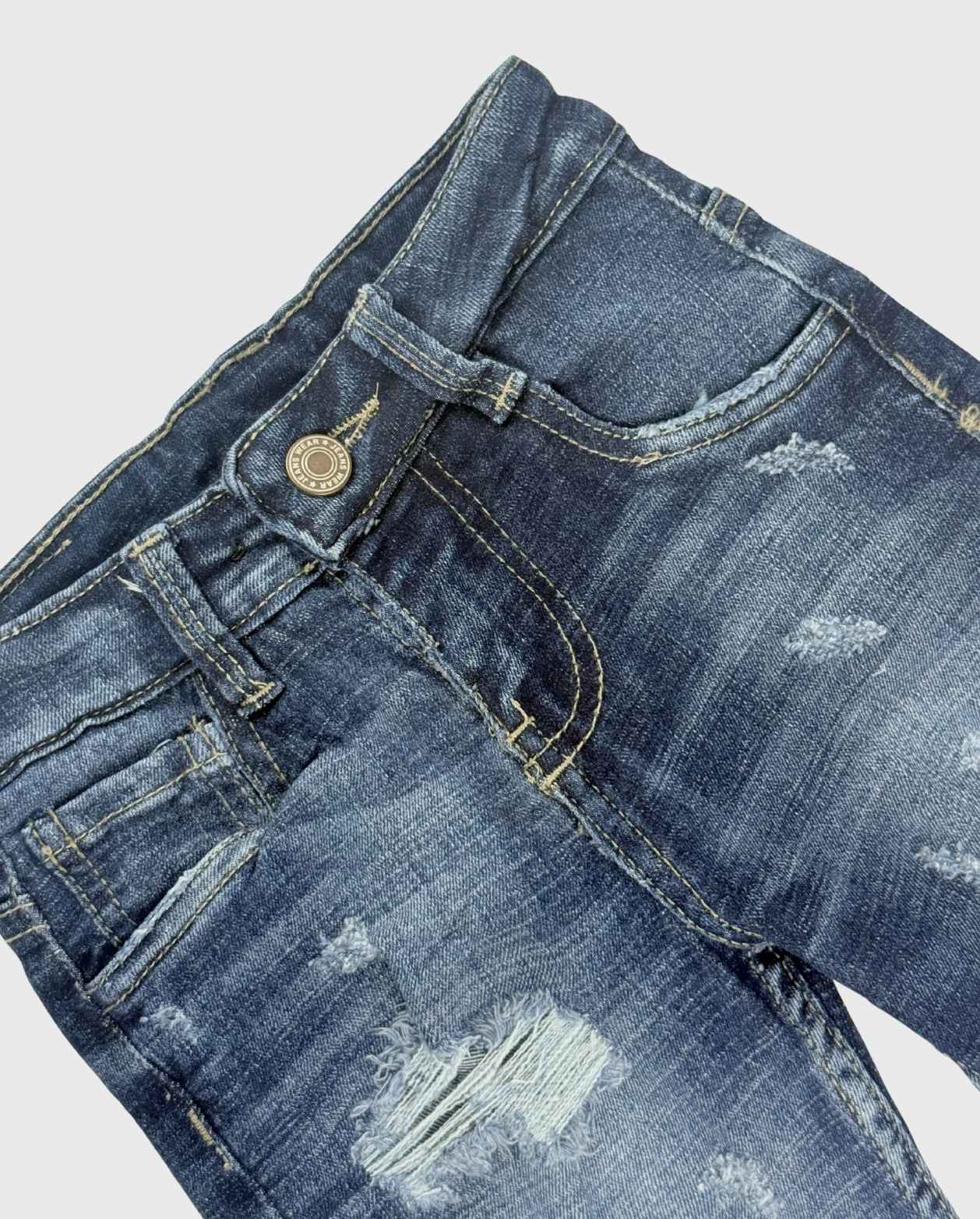 Bermuda Desgaste Denim Medio Detalles