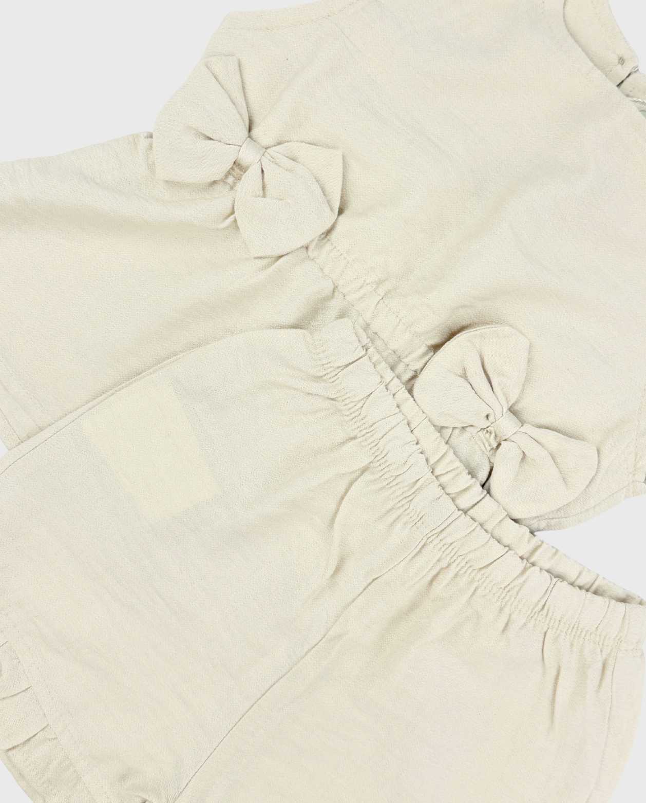 Conjunto Blusón Con Moño y Short Detalles