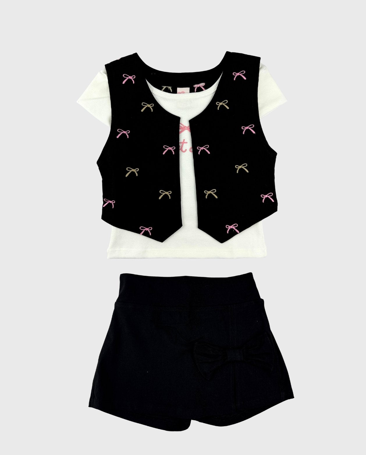 Conjunto De Falda y Chaleco Con Moños