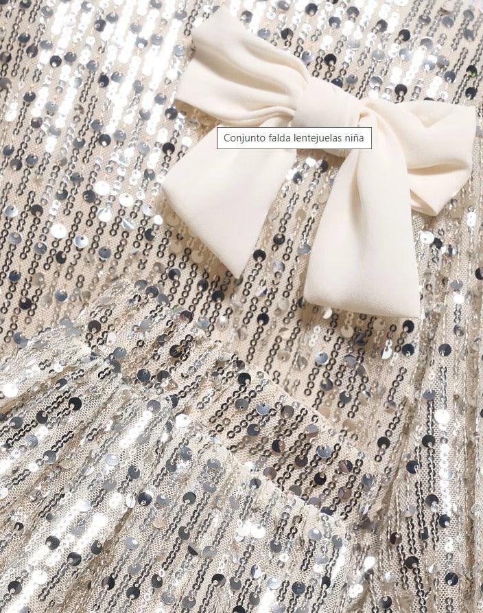 Conjunto Falda Lentejuelas Plateado Abel & Lula moño
