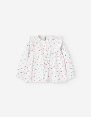 Blusa infantil blanca con flores lila y volantes LOSAN