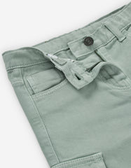 Detalle cintura botón cremallera pantalón verde menta Zippy