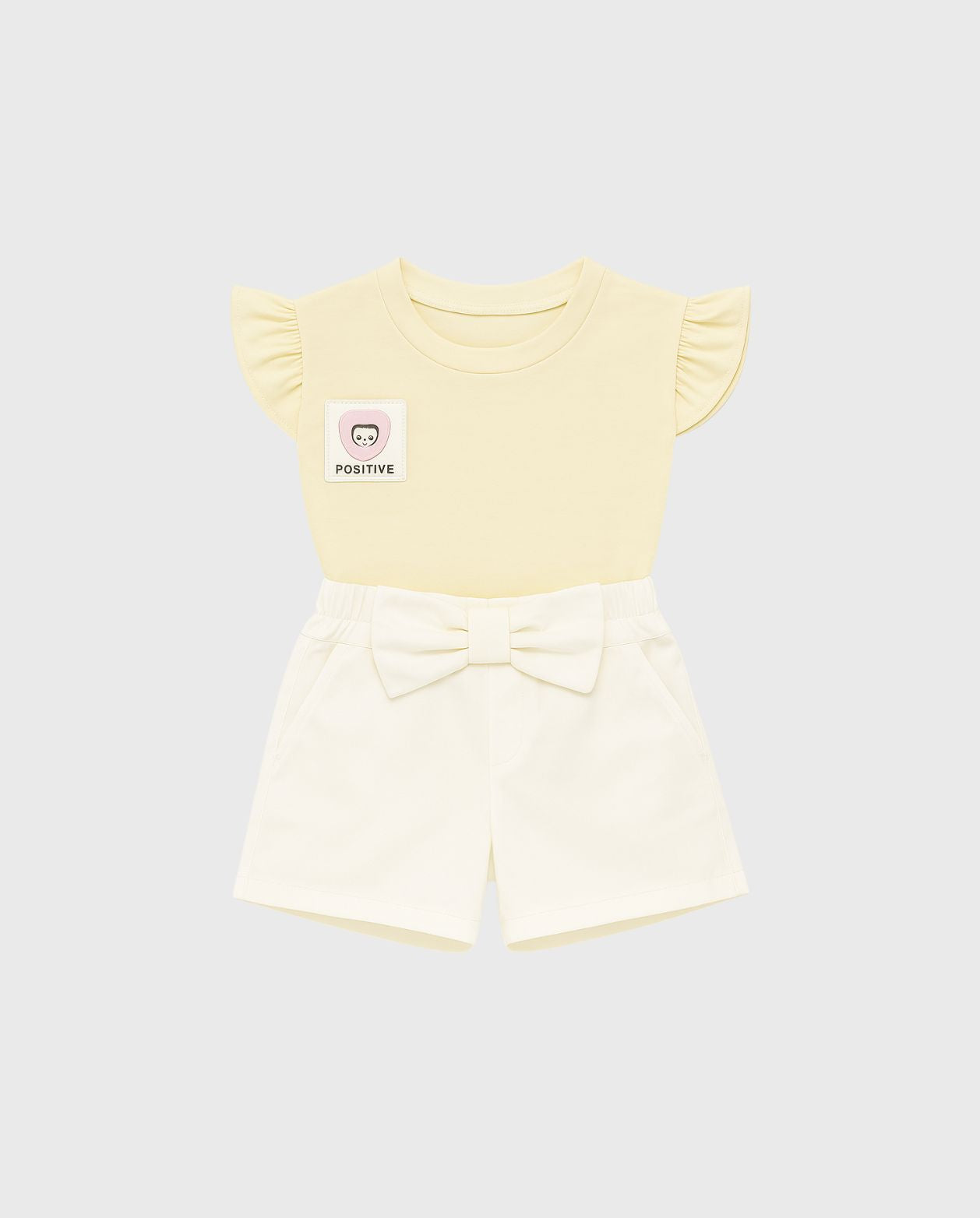 Conjunto Short Moño Blanco Blusa Crema