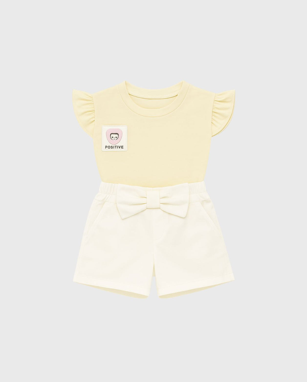 Conjunto Short Moño Blanco Blusa Crema