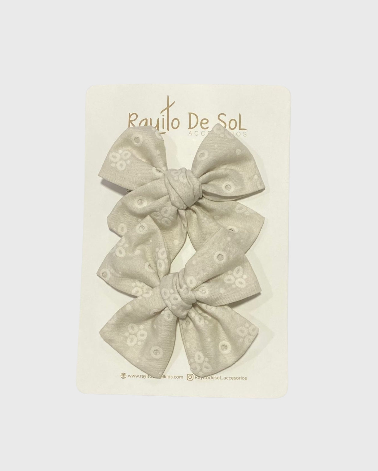 Set 2 Pinzas Moño Beige Ojalillo Rayito de Sol