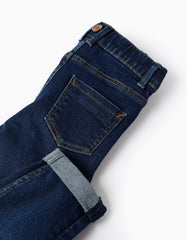 Detalle de tirantes ajustables rayados en beige y rojo