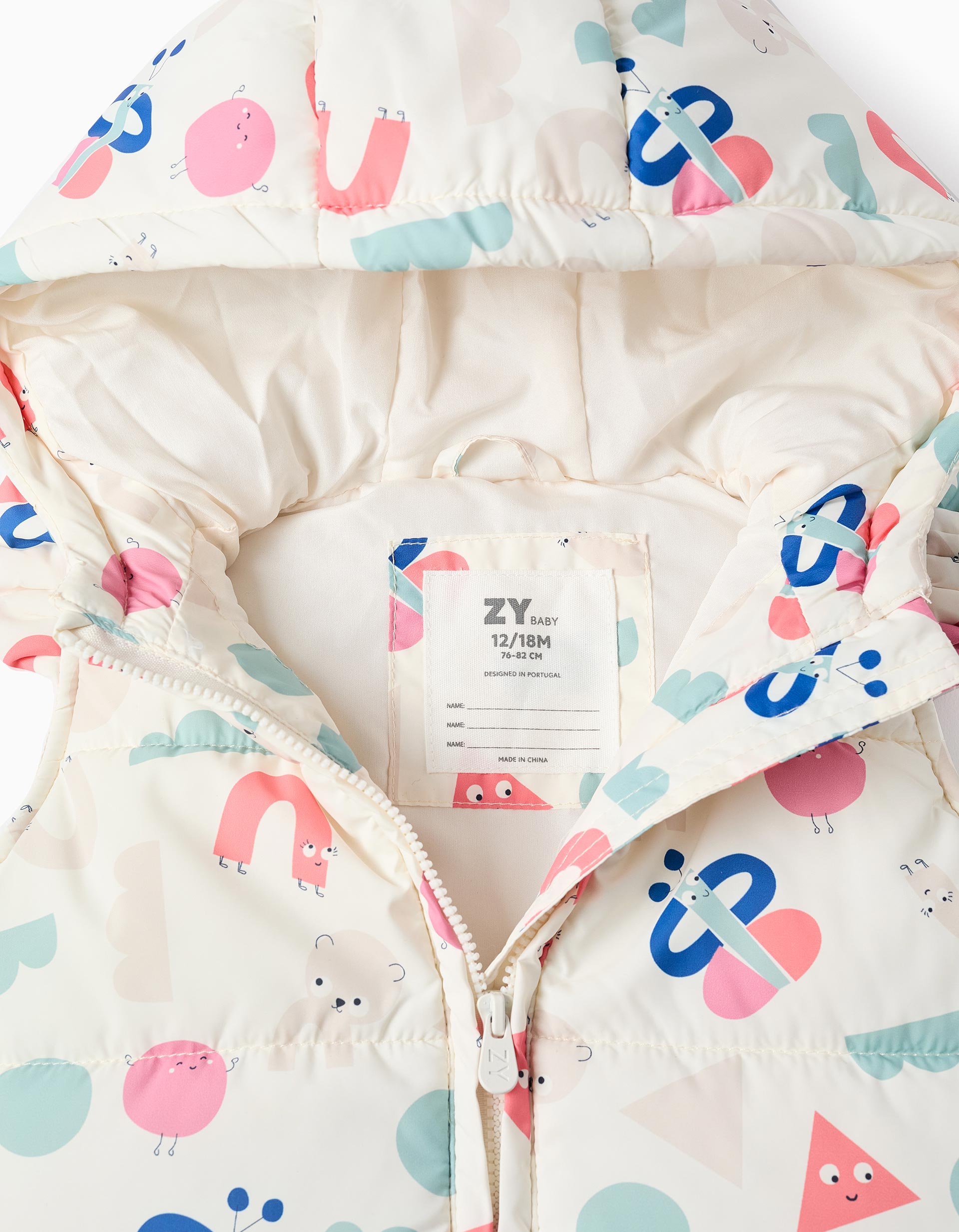 Interior del chaleco con etiqueta de talla