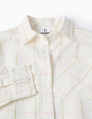 Detalle del tejido con líneas rosa y verde