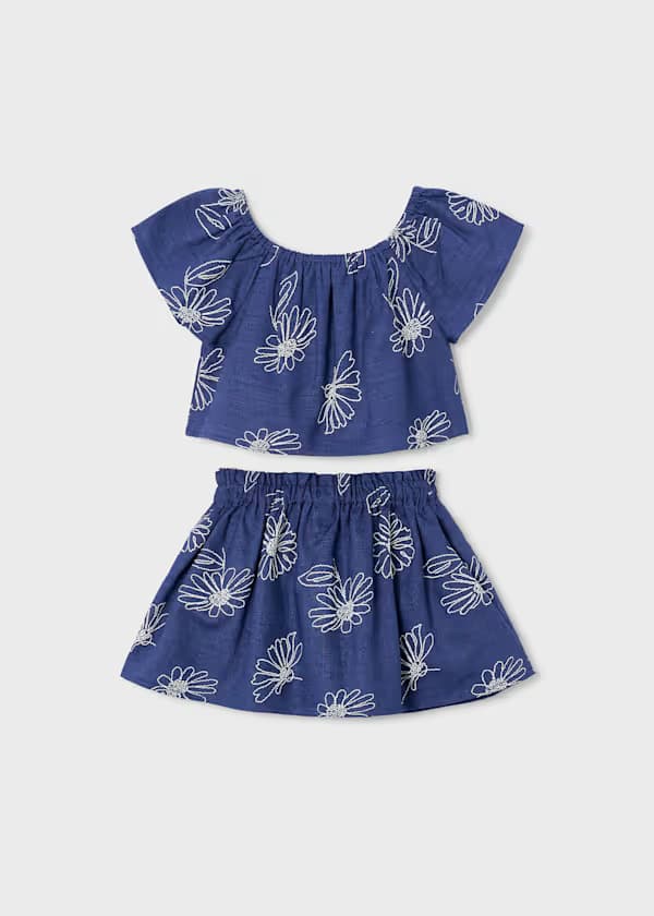 Conjunto infantil azul oscuro Mayoral con blusa y falda estampado flores
