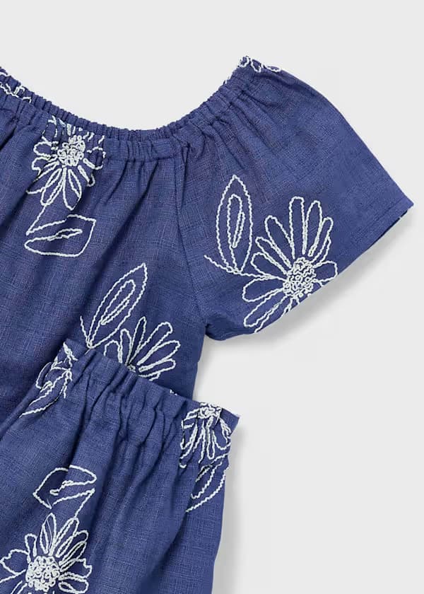 Conjunto floral azul oscuro para niña