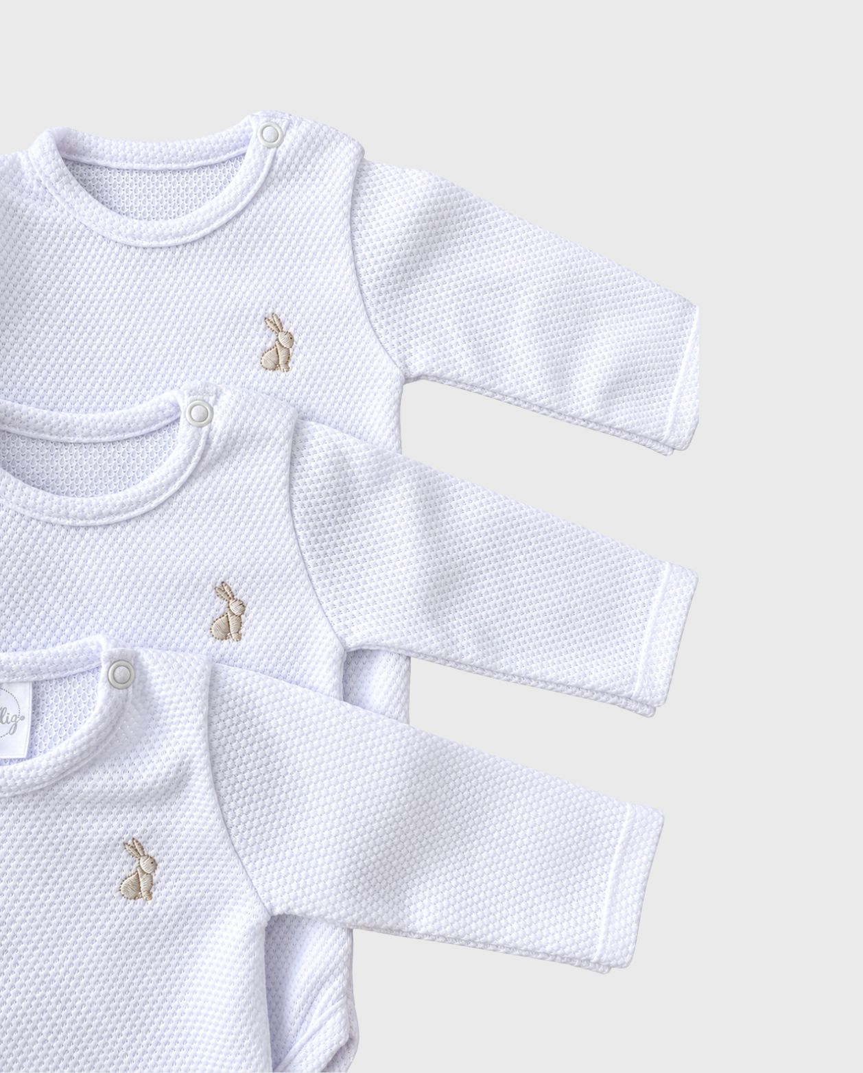 Set 3 Bodys Manga Larga Blanco Unisex DETALLE